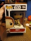 Funko Pop! Star Wars # 104- REY W/ Lightsaber