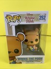 FUNKO POP DISNEY WINNIE THE POOH SEATED  # 252 VINYL FIGURE  2021