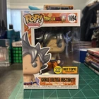 Funko Pop! GOKU (Ultra Instinct) GITD #1694 Hot Topic Exclusive