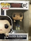 Funko Pop! Vinyl: Stranger Things - Eleven - (Elevated) #637 (In Protective Box)