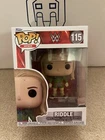 Funko Pop! WWE Riddle #115 Vinyl Figure VAULTED.     147