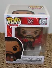 WWE Roman Reigns with Belts Funko Pop! Vinyl Figure #131 with Soft Pop Protector