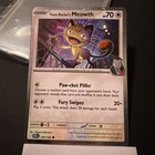 Team Rocket's Meowth