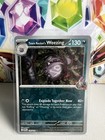 Team Rocket's Weezing