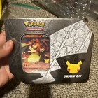 Lance's Charizard V Tin