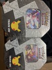 Lance's Charizard V Tin