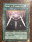 Swords of Revealing Light